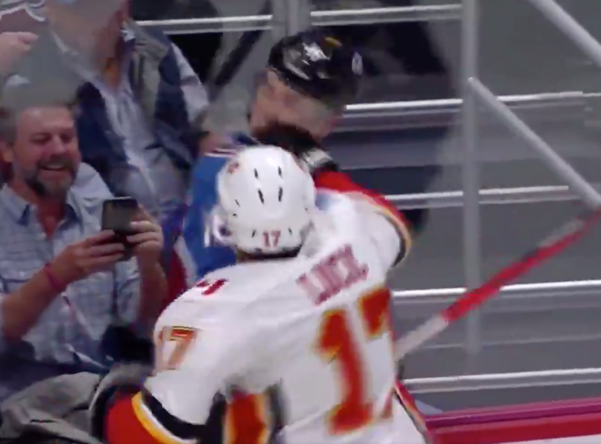 Milan Lucic accidentally punches linesman in the face during fight