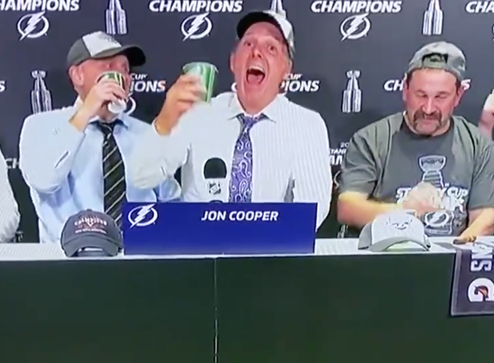 Cooper laughs it up with former Lightning player Callahan during