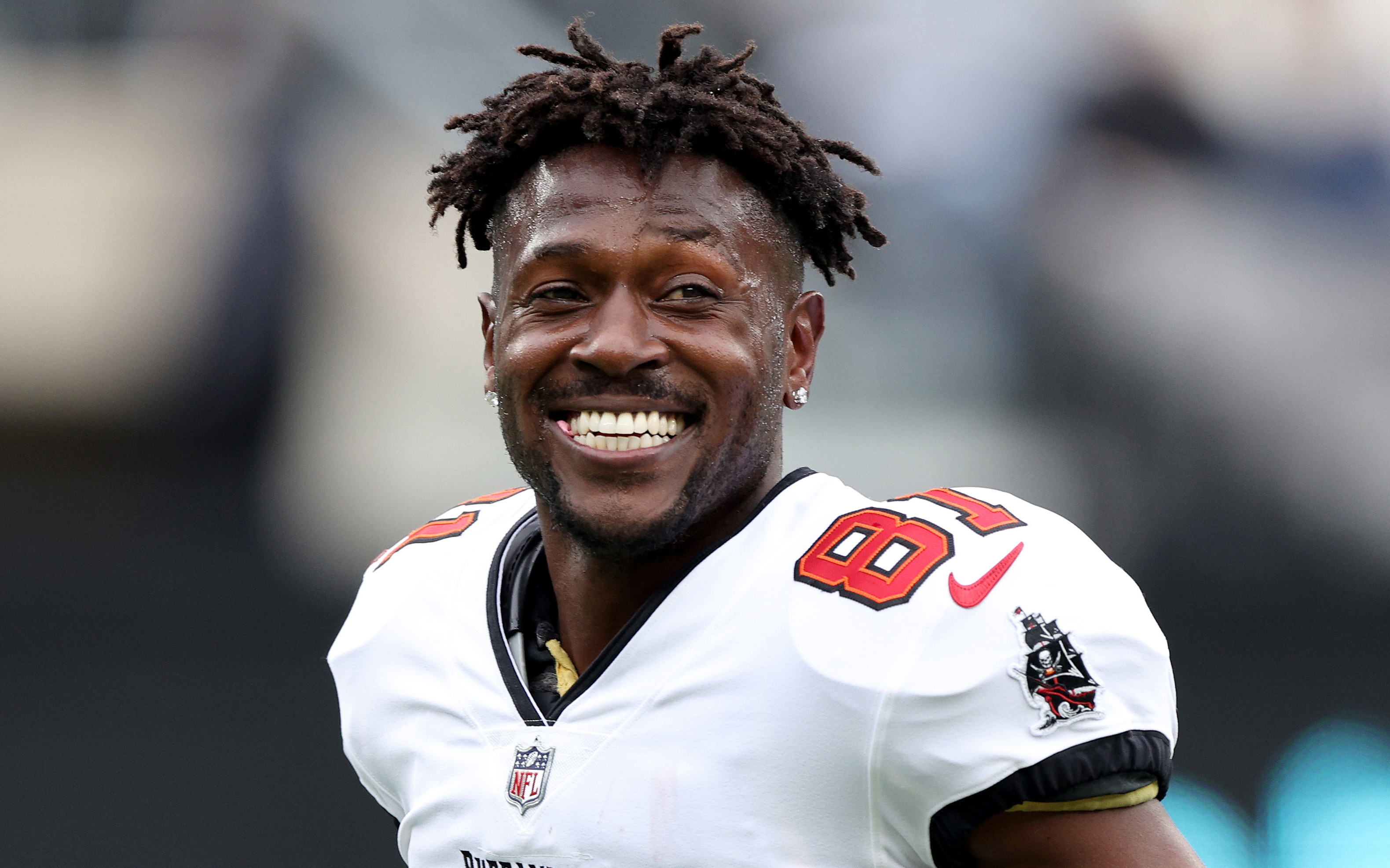Controversial NFL player Antonio Brown 'no longer a Buc' after leaving  field shirtless
